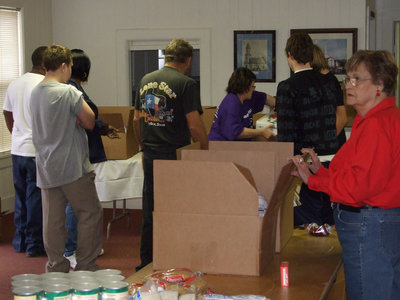 Image: Volunteers help — Denominations of all kinds gathered together to help.