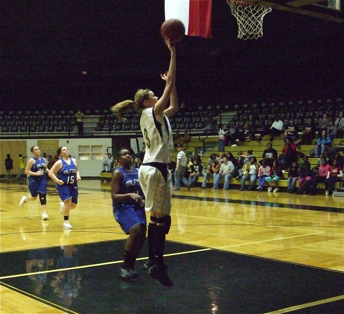 Image: Kaitlyn Rossa climbs high for 2-points against Milford on Day 2 — The Italy Lady Gladiators defeat the Milford Bulldogs 64-11 setting up a Tournament Championship matchup against the undefeated Grace Prep Lady Lions.