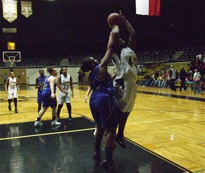 Image: You can’t stop her — Jimesha Reed(40) makes the shot and draws the foul for the Lady Gladiators.