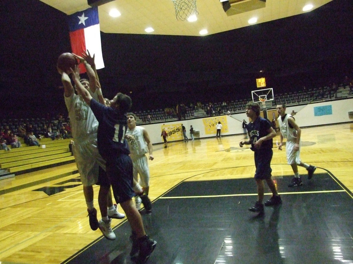 Image: Kyle gets fouled — Italy’s Kyle Jackson(50) gets fouled under the basket as Ethan Simon and Bubba Itson look on during the JV boys’ game.