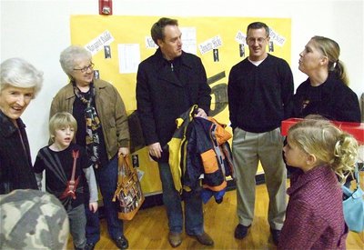 Image: Here for Linda — Italy head coach Kyle Holley and his family welcome Kyle’s former teammate, Lance Logan (middle), who arrived with his kids to support Lance’s mother, Linda (wearing a scarf), who was being honored for being a part of the 1955 girls semi-finalists basketball team.