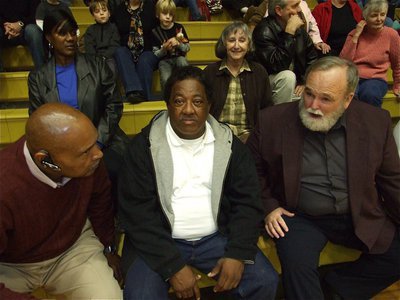 Image: Remember when… — John Ferguson and Kenny Copeland catch up wih their 1974 basketball coach, Randall Martin.