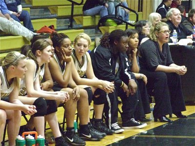 Image: Watching the action — Head coach Stacy McDonald and assistant coach Tina Richards keep their Lady Gladiators concentrated on the game.