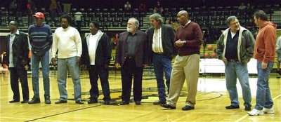 Image: Players honored — The 1974 boys regional finalists team was honored at halftime. In attendance, left to right: Howard Wilson, Travis Ferguson, Willie Reese, Kenny Copeland, Coach Randall Martin, Stephen Carter, John Ferguson, Gary Helms and Jimmy Weaver.