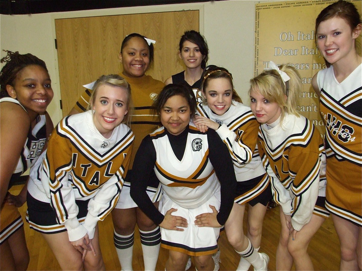 Image: Back in time — The current Italy High School cheerleaders took us back in time wearing cheerleading uniforms from the past and lots of make-up.