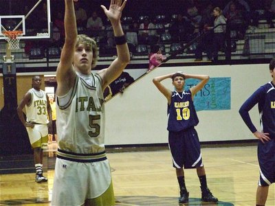 Image: Colton impresses — Colton Campbell(5) hits a free throw wearing old, old gold.