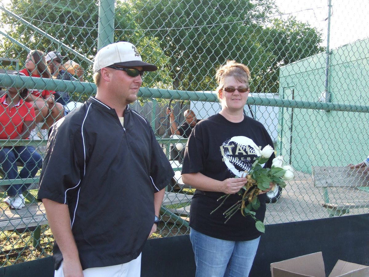 Image: Coach Ward and DeeDee Hamilton — DeeDee Hamilton presented the seniors and their family with gifts.