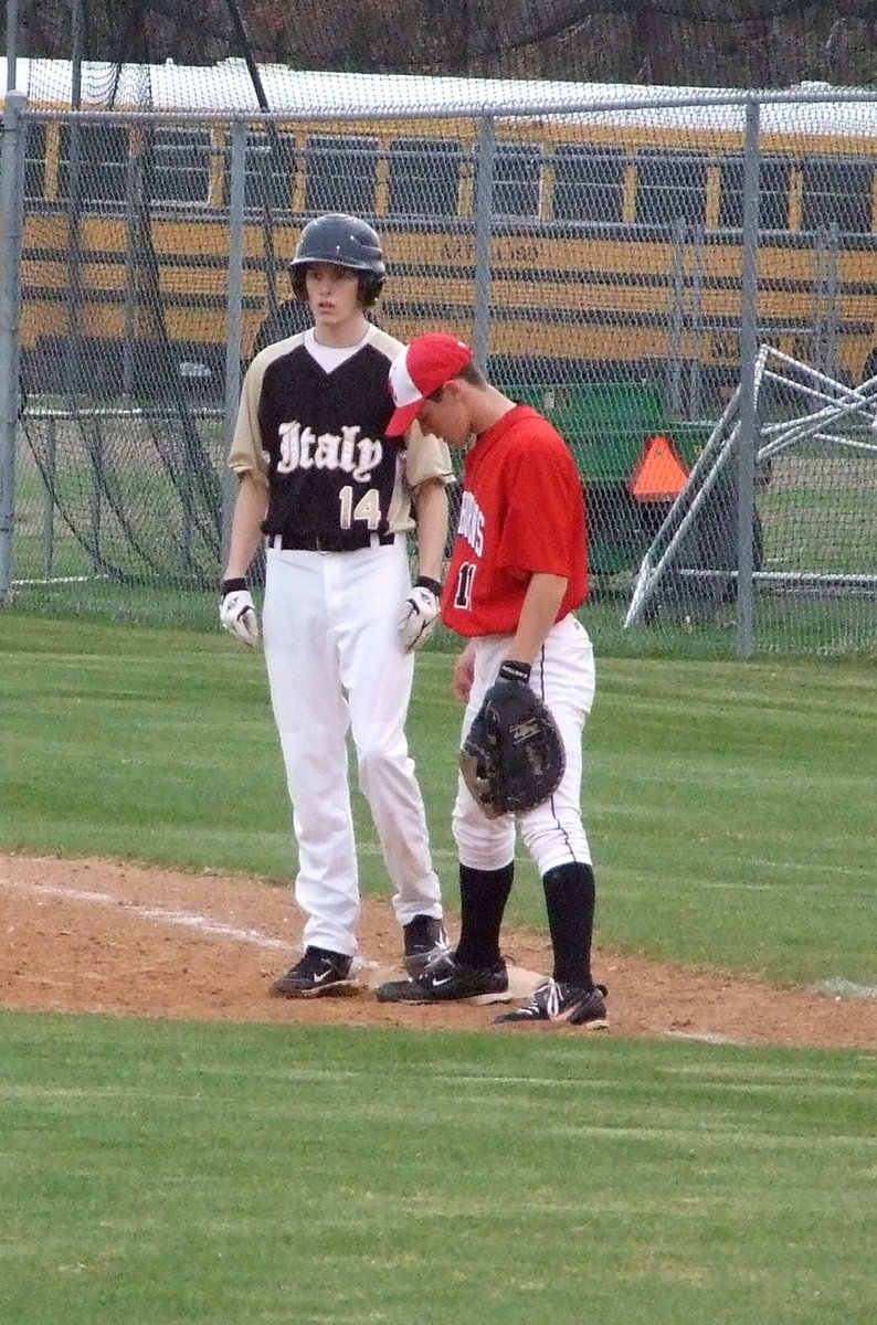 Image: Colton is working his way around — Senior Colton Campbell is on first ready for the next batter.