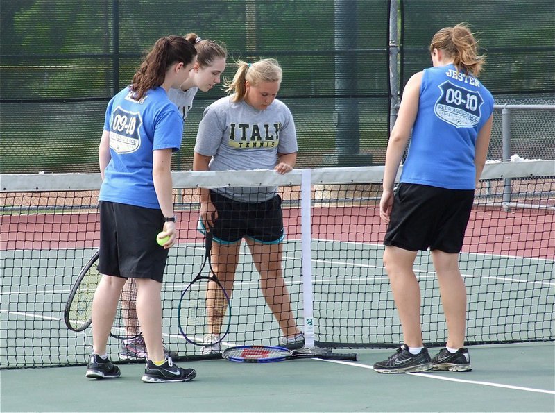 Image: Italy’s Melissa Smithey and Drenda Burk, get set to play tennis — Against Whitney, Melissa Smithey and her doubles partner, Drenda Burk, await the result of the traditional racket spin to determine which team serves first during the JV district tennis meet held at Alvarado High School.
