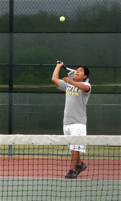 Image: Natural talent — Calm and calculating, Cruz Enriquez had his first round opponent rattled on day two of the varsity boys singles matches.