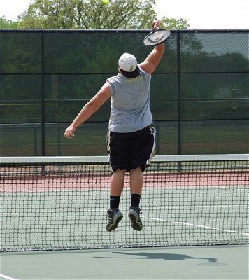 Image: Brutal slam — Italy’s Kevin Roldan patrols the net during a doubles match against Rio Vista.