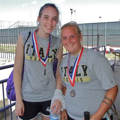 Image: Ultimate warriors — Melissa Smithey returned to the court despite taking ill in the second match and doubles teammate, Drenda Burk, struggled through a sore right elbow as the pair won 9 out of their last 11 game points to claim 3rd place during the district tennis meet in Alvarado.