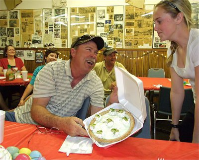 Image: Pie in the face? — Kelsey Nelson offers to let Tommy Morrison key lime pie her in the face for additional $15.00 over his final winning bid of $35.00. Tommy’s thinking about it…