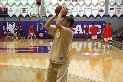 Image: Ryan gets ready — Senior Ryan Ashcraft warms-up before Italy’s regional final game against Melissa.
