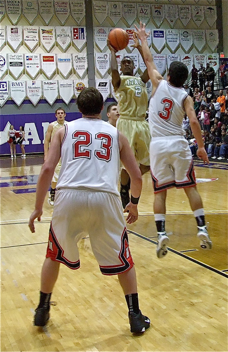 Image: Snoop to the hoop — Heath Clemons(2) tries to make something happen and takes a shot at the basket.