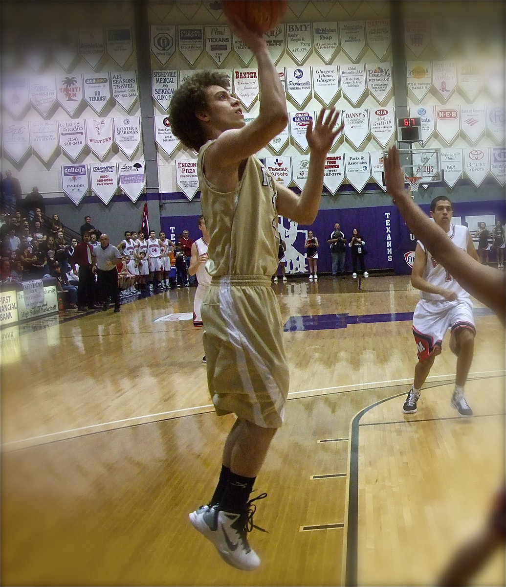 Image: Full of memories — Italy’s Brandon Souder(15) concludes the Gladiators 2010-2011 season with one final basket to beat the buzzer. Italy finishes as the Region II-AA Regional Final Runner-Ups after loosing to the Melissa Cardinals 74-42.