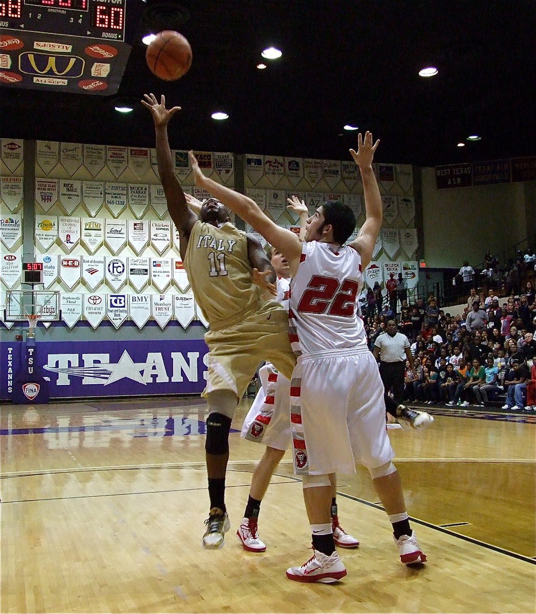 Image: A scoring machine — The “Beast” within Jasenio Anderson(11) gets inside the paint for another basket.