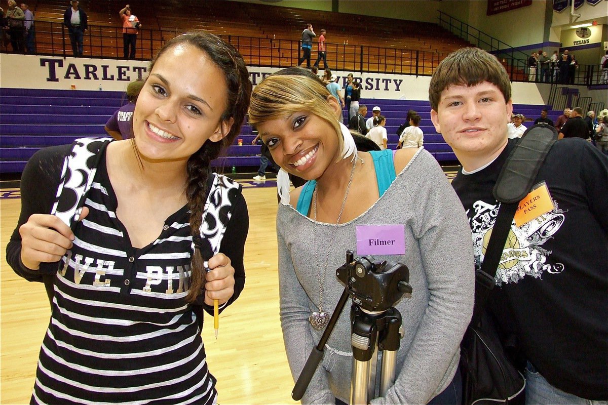 Image: Behind the scenes — Anna Viers, Kyonne Birdsong and Jake Escamilla take care of things behind the scenes for the Gladiators.