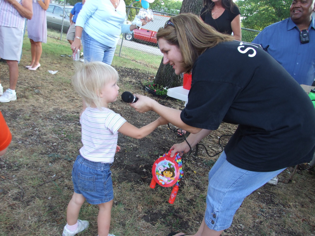 Image: Raffle Winner — There were lots of raffle winners. Every time you turned around Clover Stiles was calling out names of winners. Here is a really cute winner!