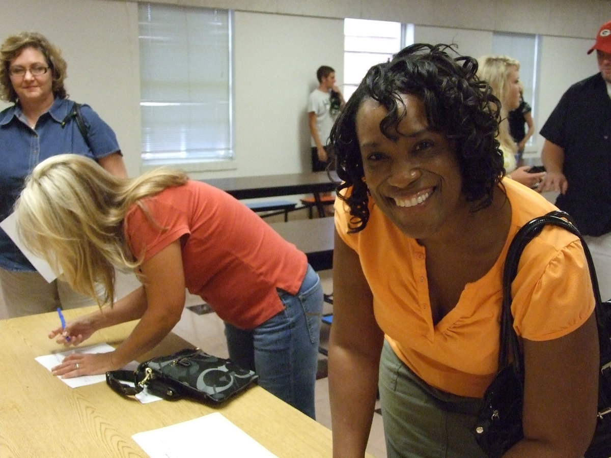 Image: Volunteers sign up — Ms. Parker requested parents to volunteer their time at the school and help students where and when they can.