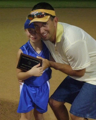 Image: Lacy &amp; Dad — Tournament Official Stephen Mott puts on his Dad cap and holds his daughter Lacy.