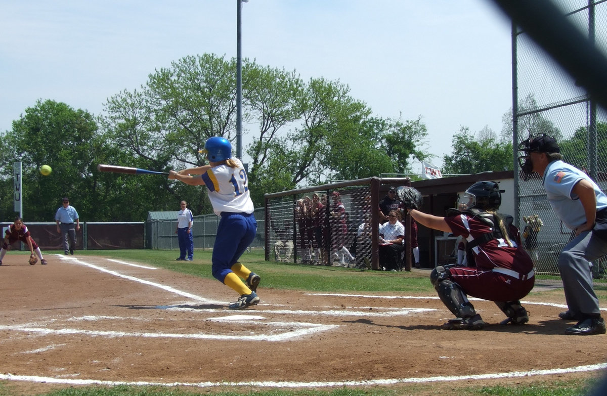 Image: Left handed — At the tender age of 14, Sarah was turned into a left-handed batter.  She has been there ever since.