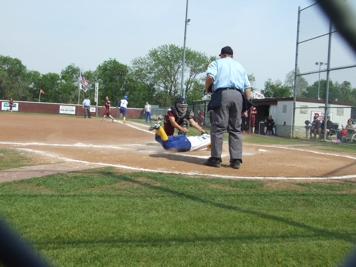 Image: She scores — The Rambelles played Texas Womens University in May.  They won the 3 game series.