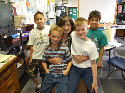 Image: Judy Carter and Class — Judy Carter also is in the summer school program an these are her third grade reading students.