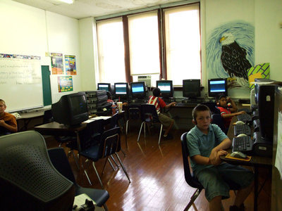Image: Fourth Grade Reading Lab — Denise Wimbish is teaching fourth grade computer lab for reading.
