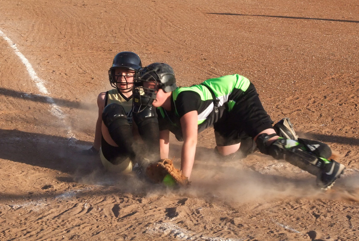 Image: Collision at the plate — The call went against Italy by the Hillsboro catcher pays the price.