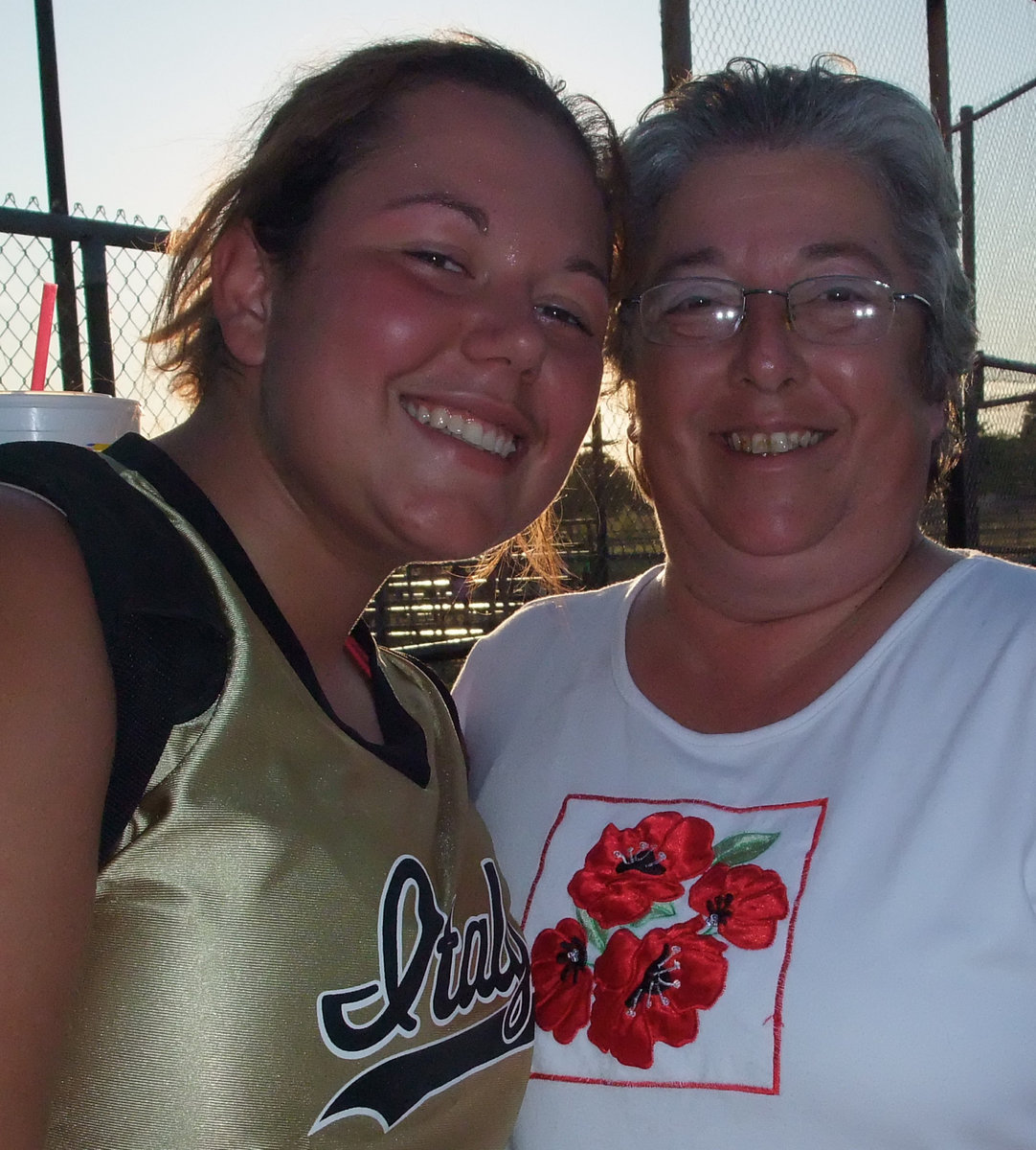 Image: Nikki and Nora — It was all roses after the game as Nora Brashear congratulates daughter, Nikki Brashear, on her hard fought effort.