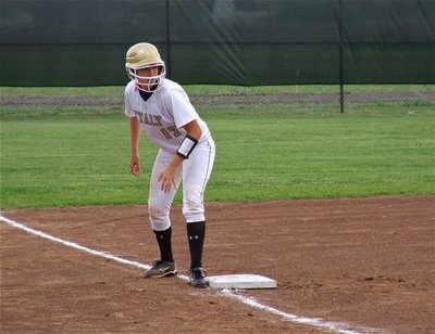 Image: Ready to score — Megan Richards(17) gets ready to make a play at home plate against Whitney.