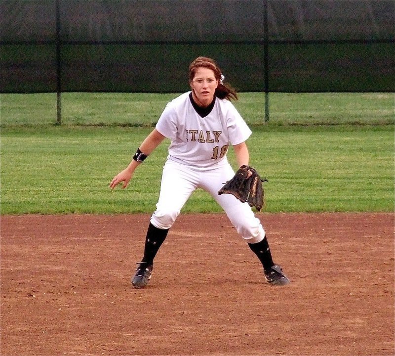 Image: Bumpus at short — Bailey Bumpus(18) tries her glove hand at shortstop.