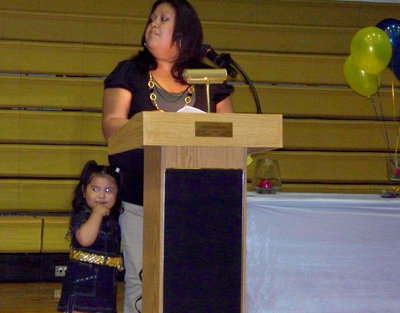 Image: The Pres and her V.P. — FCCLA’s honorable President Claudia Rodriguez speaks to the audience with her Vice President, which is Claudia’s beautiful daughter Anna, standing by her side.