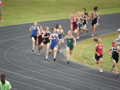 Image: Rossa rounds the turn — Freshman Kaitlyn Rossa finished in 5th Place at Regionals.