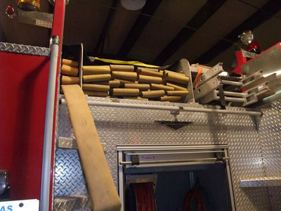 Image: Response time — For every one hundred feet of fire hose, every inch has to be paid for.