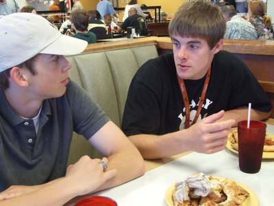 Image: Dan And Ryan — Dan Crownover and Ryan Ashcraft strategize on getting seconds at the buffet line.
