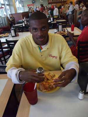 Image: John Isaac — John Isaac prepares to slice through a stack of pizza like he did against the competition throughout Italy’s dramatic playoff run.