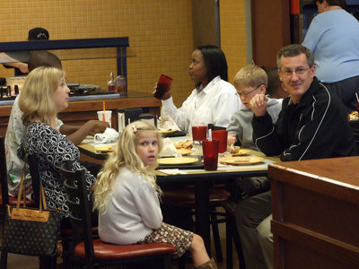 Image: Holley’s Enjoy CiCi’s — Italy Head Coach Kyle Holley enjoys celebrating with his family and basketball team at CiCi’s Pizza in Waxahachie.
