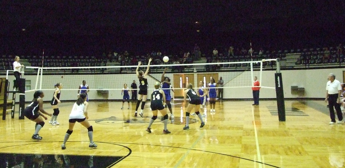 Image: Milford hits — Lady Gladiators wait for the hit by Lady Bulldogs