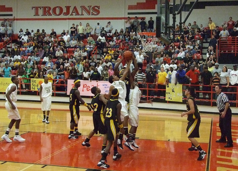 Image: Our Lane — Dontavius and Jasenio crash the board against Itasca.