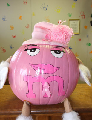Image: Pink pumpkin — This beautiful pink pumpkin was painted and created by Alicia Farmer.