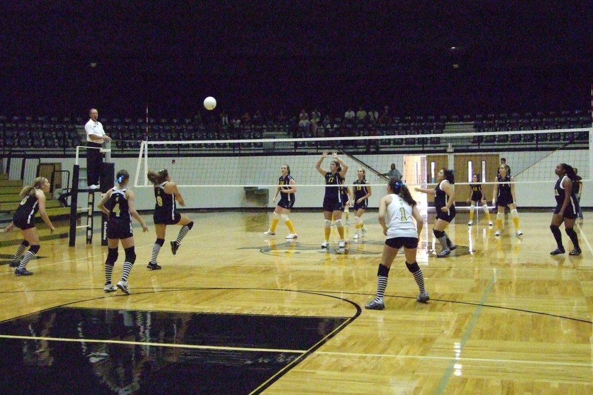 Image: Lady Gladiators return — Junior Cori Jeffords, returns the volley.