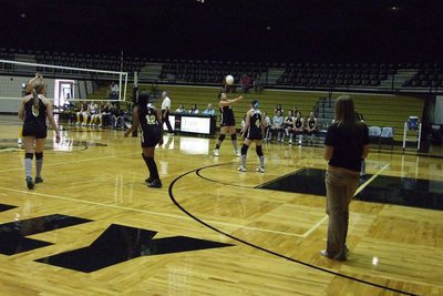 Image: Molly Haight recovers — Sophomore Molly Haight, recovers the volley.