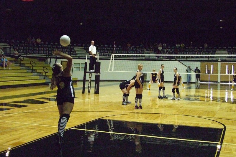 Image: Cori Jeffords serves — Junior Cori Jeffords serves the ball.