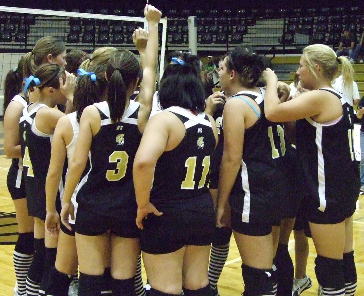 Image: The Ladies are winners — The winning huddle.