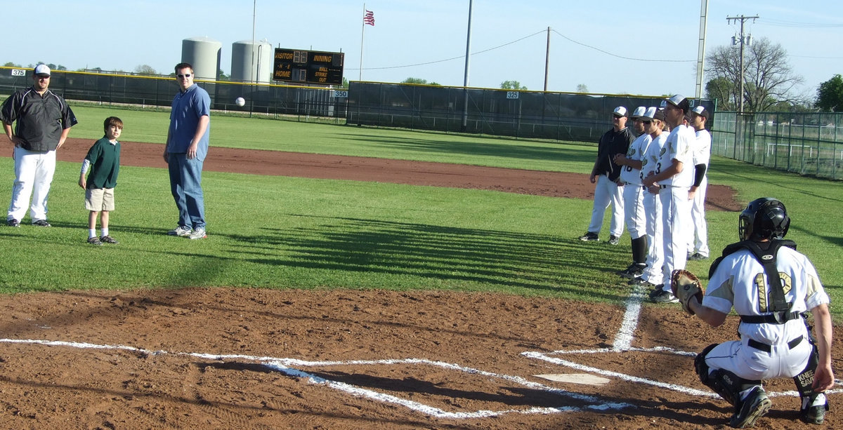 Image: Mikey throws a spit ball — Lining up the mound with the catcher, Mikey South throws it down the line.