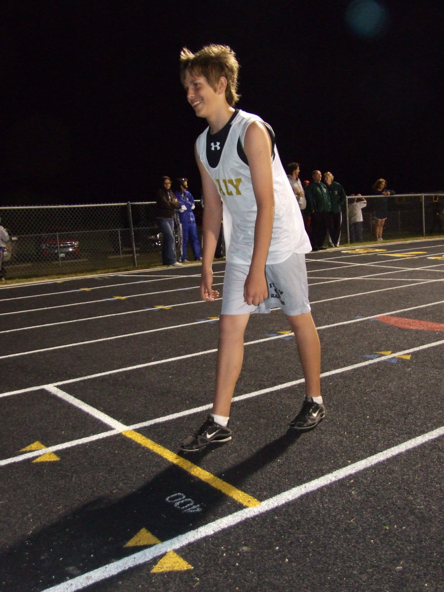 Image: Hopkins hopes to win — Cole Hopkins goes for the gold with a winning smile. Hopkins also made a 5th place heave at 84’ 8 1/2"  in the discuss.