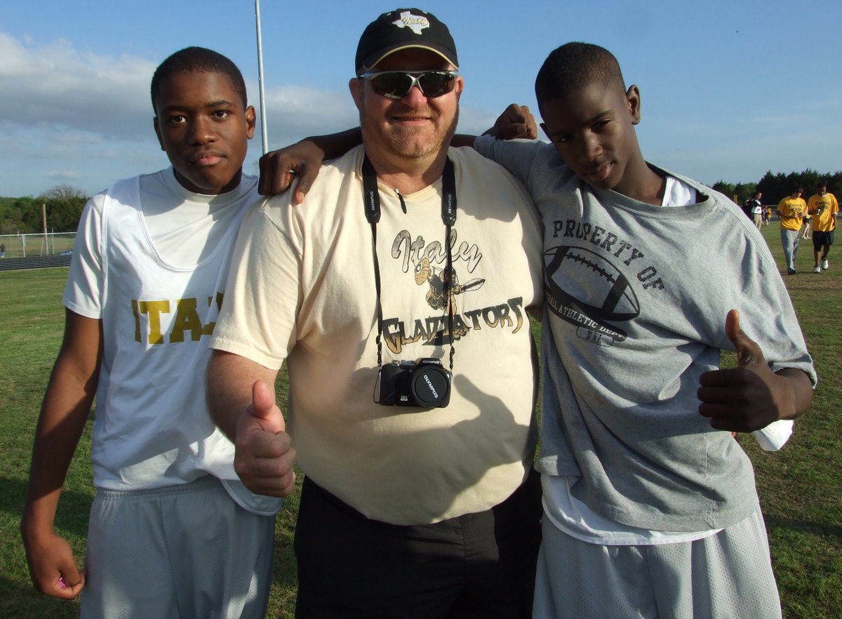 Image: Thumbs up — Paul Harris, Coach Sollers and Tyvion Copeland are proud of the Junior High track team’s accomplishments at the District meet in Hubbard.