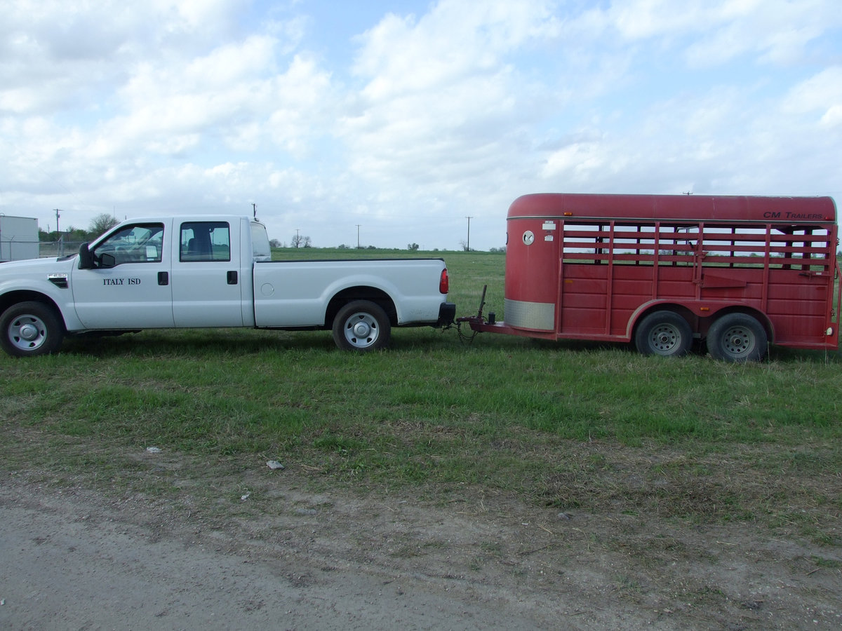 Image: Mr. "D"s ride — Loaded with pigs, FFA teacher, Sonny Dickerson, takes his students and their projects to the annual expo in Waxahachie.